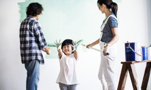 Asian family renovating the house