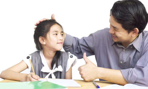 Daddy teaching his kid during doing homework